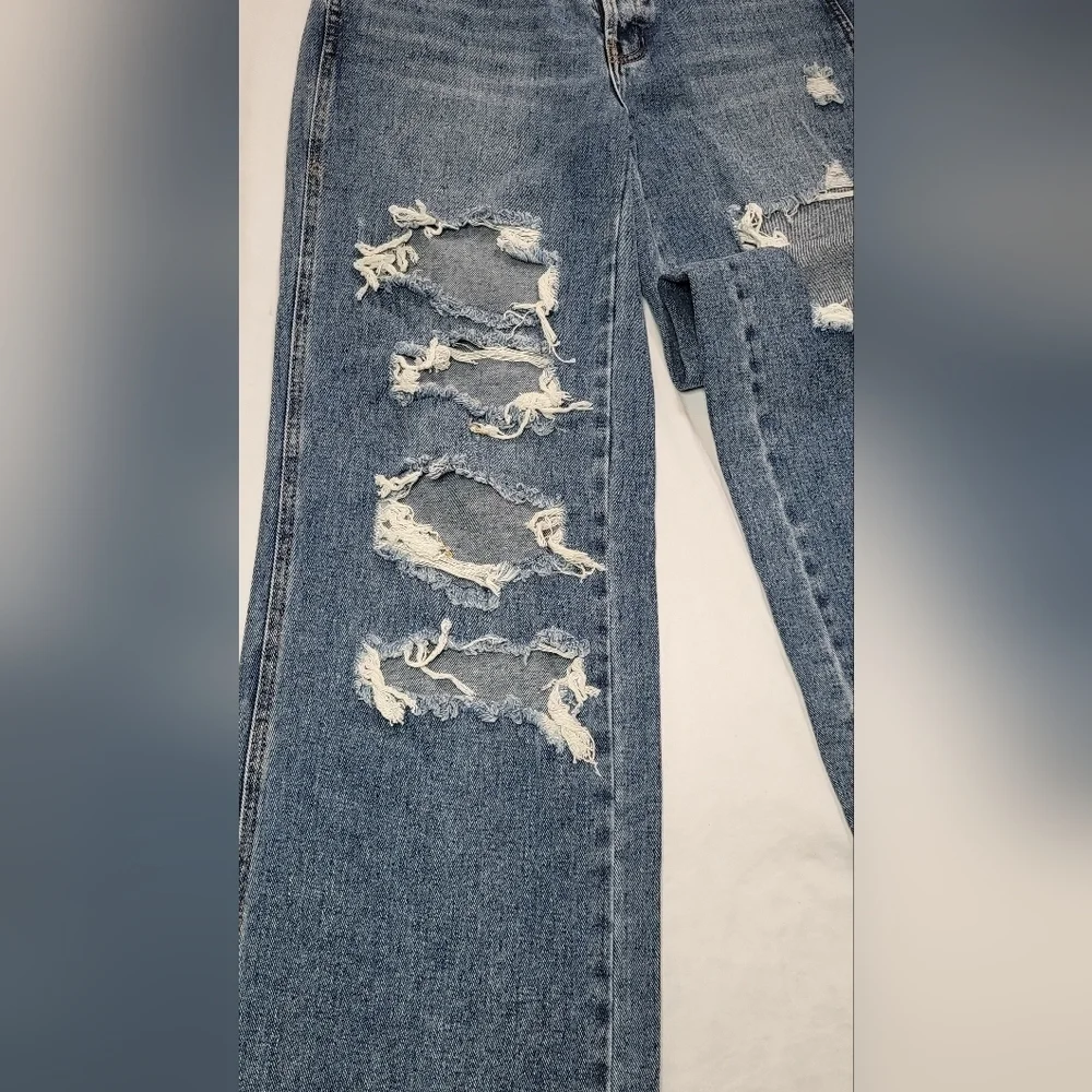 Women's Distressed Blue Jeans
